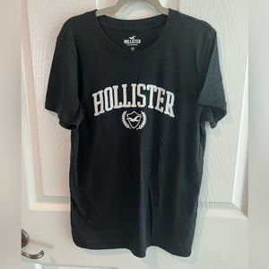 Black XS Hollister tee with raised embroidery.